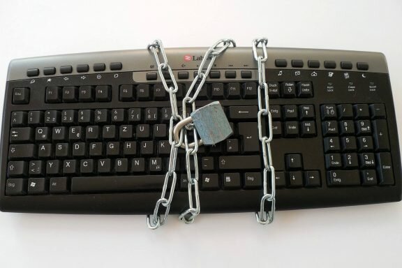 Computer keyboard chained up