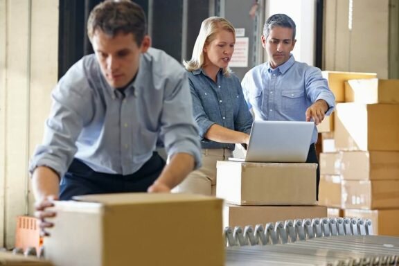 Staff within a small business warehouse